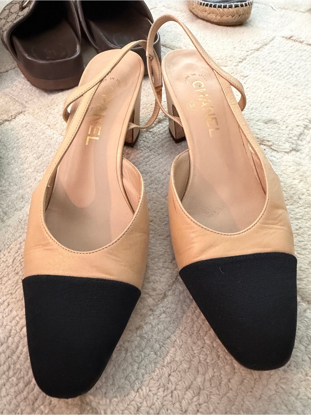 CHANEL Two-Tone Beige Leather Slingback Pumps with Black Cap Toe
